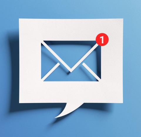 Inbox receiving electronic message alert. Abstract minimalist design with cutout paper and blue background.